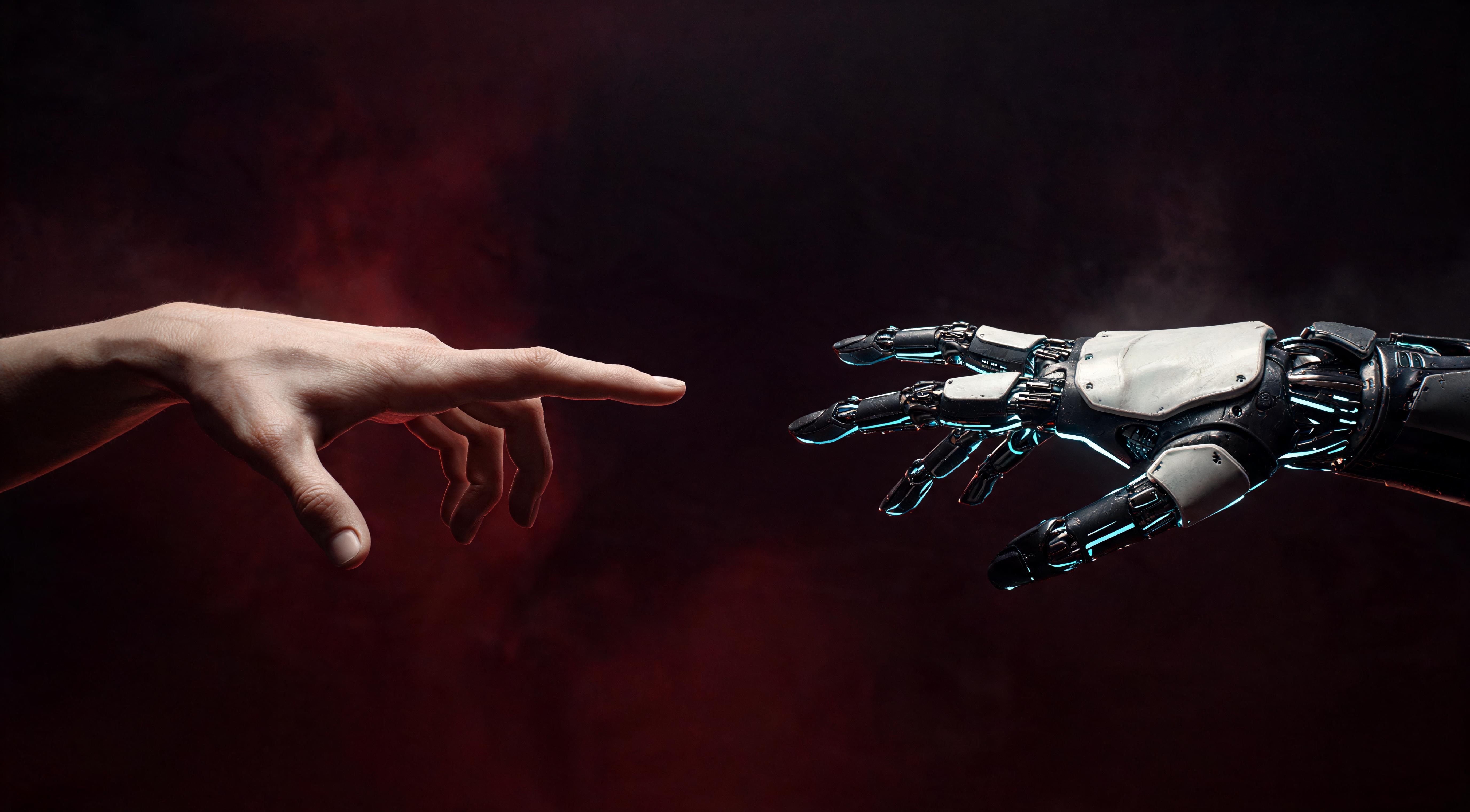 A human hand reaching toward a cyberpunk robotic hand
